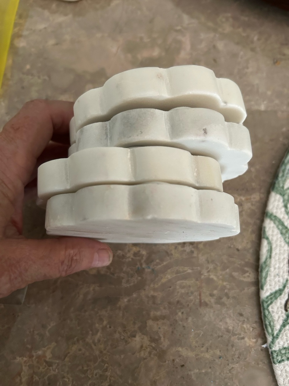 Rounded marble coasters with bottom protectors, set of four